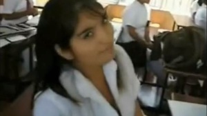 A college student has sex with his girlfriend in class.