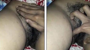 Dark-haired erotica star’s husband plays with and records her lingerie clad body.