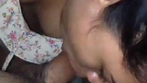 A beautiful girl giving a blow job