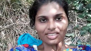 Pretty girl having sex with her boyfriend in a village outdoor setting