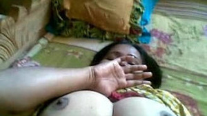 Desi aunt shows her breast and vagina in the video.
