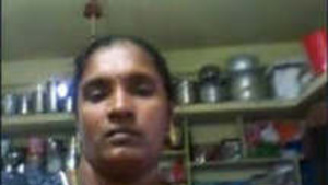 A married Telugu woman exposes her breasts.