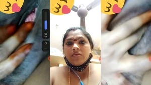 A beautiful wife is displaying her black puffy pussy on VK