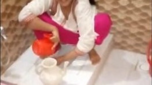 A aunty from the East suddenly feels the need to urinate and fumbles with herself.