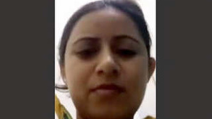 Endearing Indian girl breastfeeding and exposing her private part in a video call