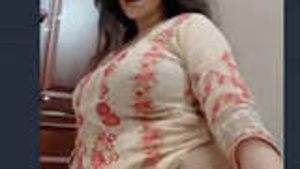 Office worker with big assets exposed in part one.