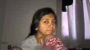 Anjali, a Malay babe, gives her husband's friend a blowjob in public.