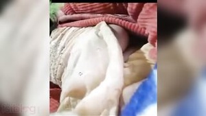 A hot Indian woman exposes her large breasts to her lover via video call.