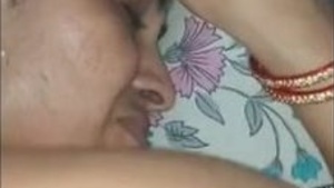 A sexual intercourse with a woman on her hands and knees.