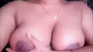 Married Indian Bhabhi showing her big boobs in a porn video