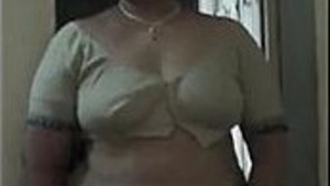 Beautiful Indian teacher showing off her hourglass figure.
