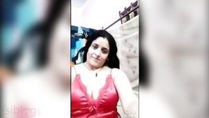 Hot Indian house wife strips to tease her lover.
