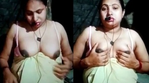 A rural Indian housewife shows her big Boobs on a live webcam.