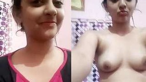 Sopna, a cute girl from an Indian background, shares her bosom with the viewer.
