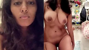 Big-boobed woman flaunts her assets