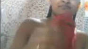 Beautiful Bengali woman swims in the bath during a video call.