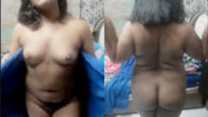 A young girl from Tamil Nadu showing her chest and accidentally flashing her butt.