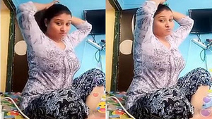Beautiful Indian woman with big breasts in hot scene.