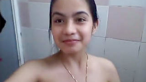 Beautiful Indian girl stripping and showing her body