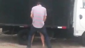NRI woman gives blow job and has sex with her boyfriend near a truck.