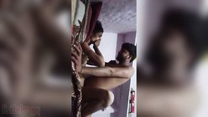 A Hindi sex video featuring a couple having sex.