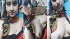 Boob show and nude self-portraits of an Indian woman for her lover’s video.